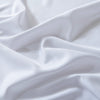 Close-up of white bamboo fabric with folds