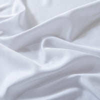 Close-up of white bamboo fabric with folds