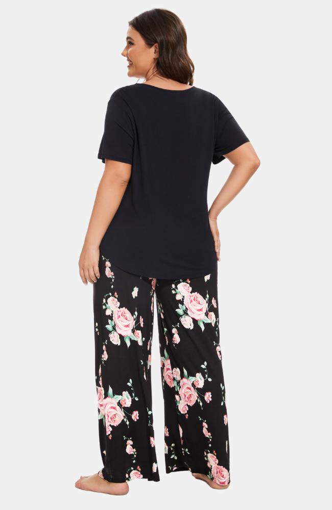 Wide leg bamboo PJ/Lounge pants with pockets. Black with floral print. Curve S-4XL. Back.